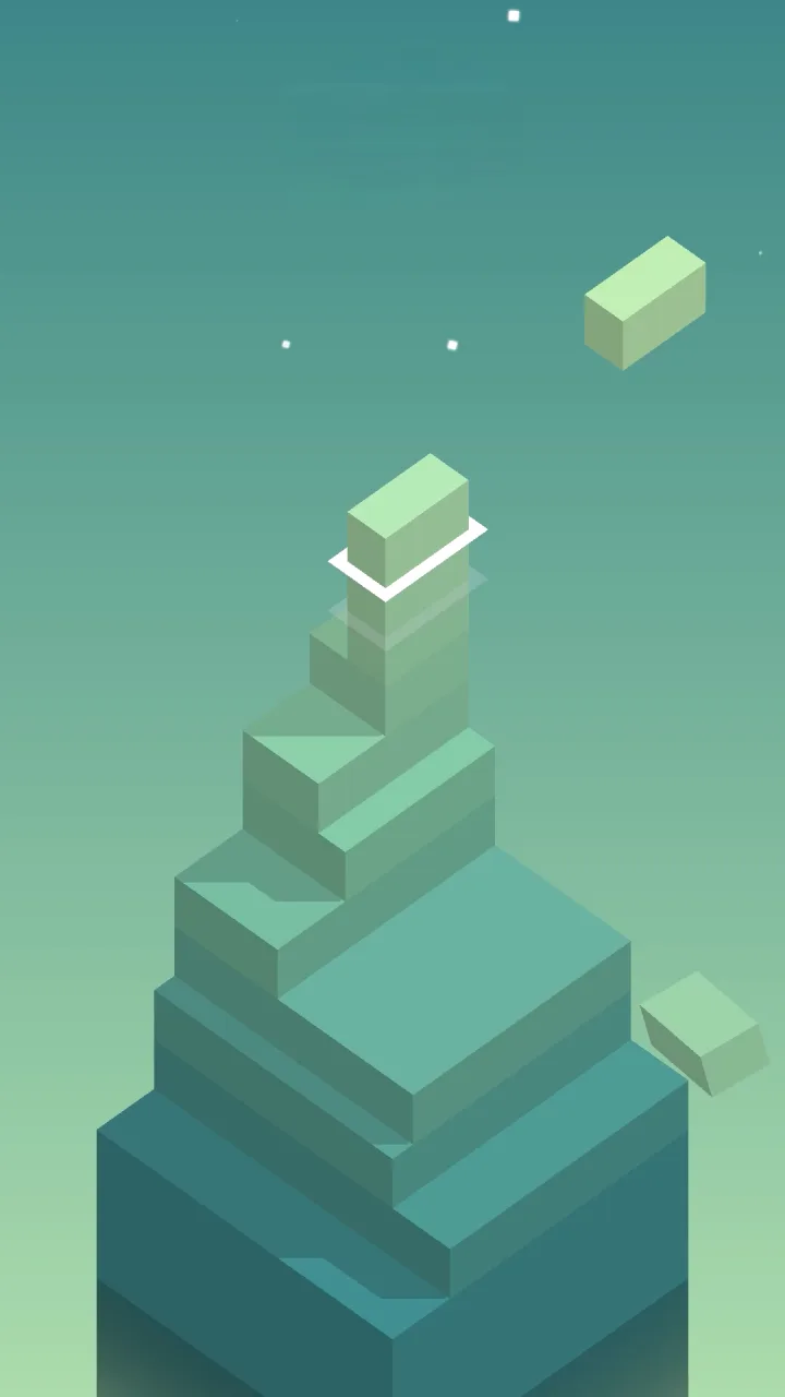 Torre di blocchi in costruzione su fondo verde